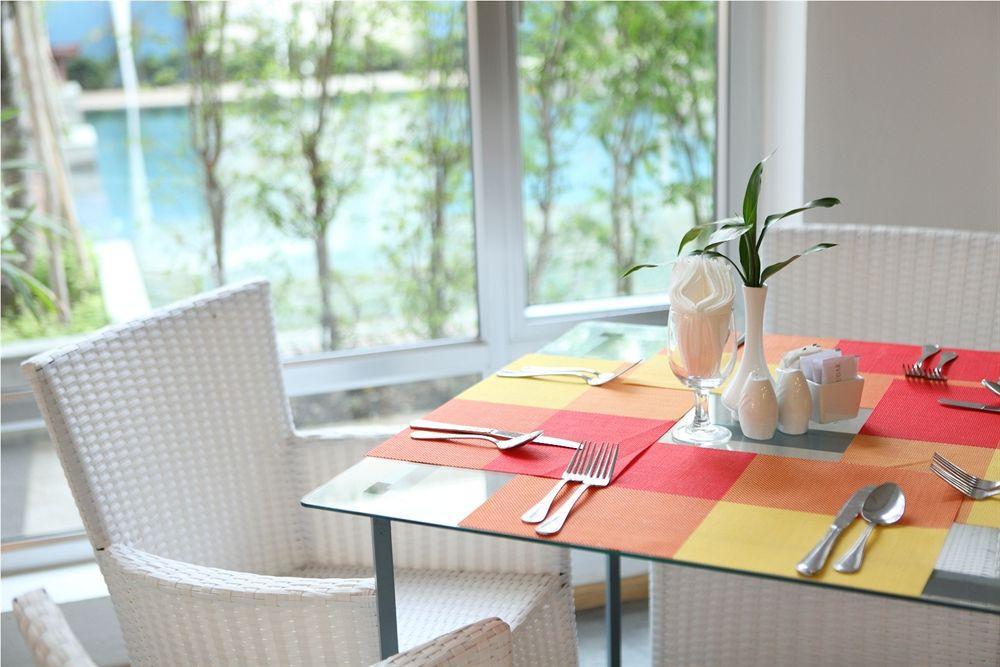 The Frangipani Living Arts Hotel And Spa Phnom Penh Restaurant billede